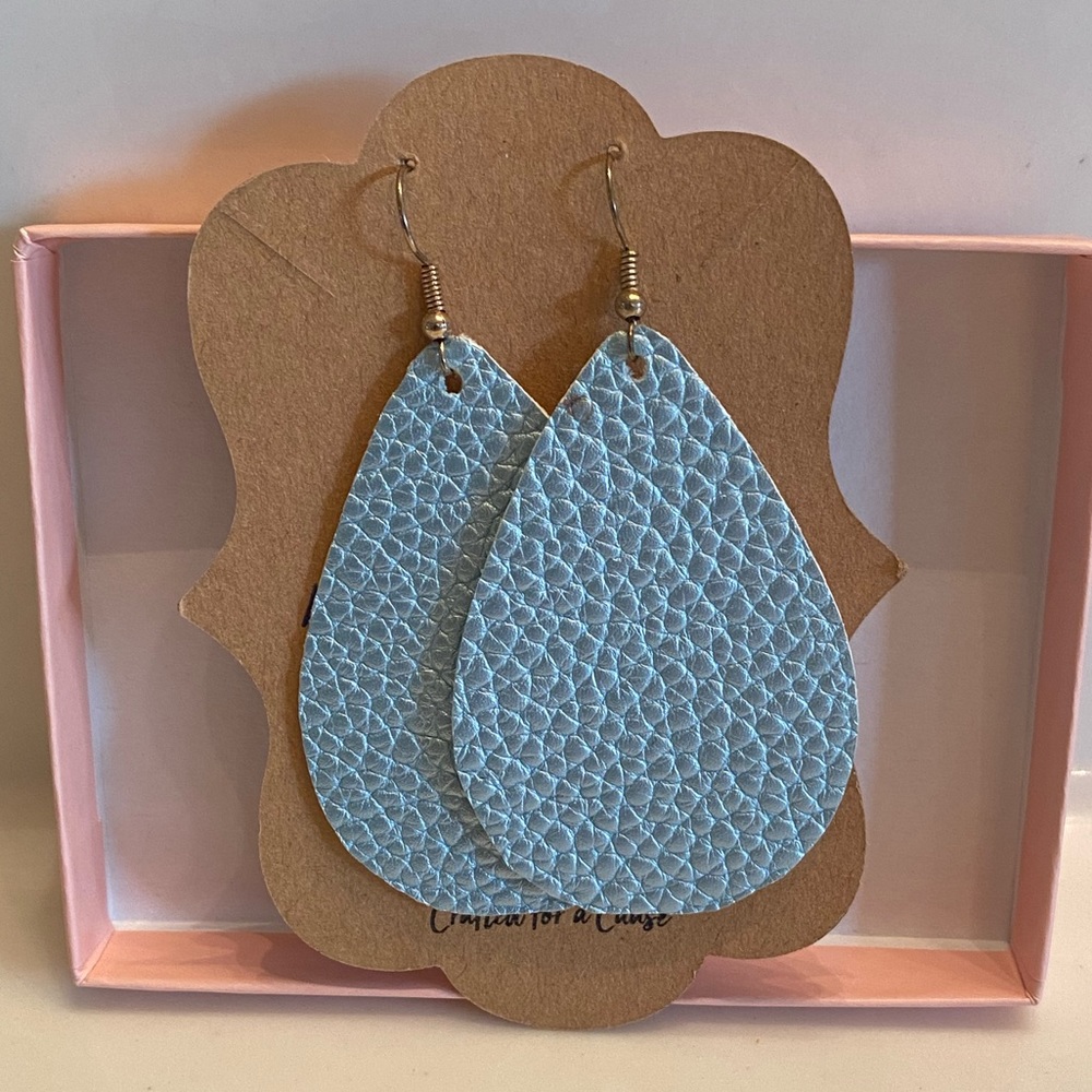 Lightweight pale blue leather teardrop earring. Brand new.